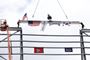 Ironworkers and construction partners at the Ultium Cells battery cell manufacturing facility install the final beam as part of a traditional “topping out” ceremony Wednesday, June 8, 2022 in Spring Hill, Tennessee. Photo by Wade Payne for Ultium Cells.